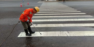 攸县政府门户网站 县城管局环卫处清洗城区路段交通标志标线